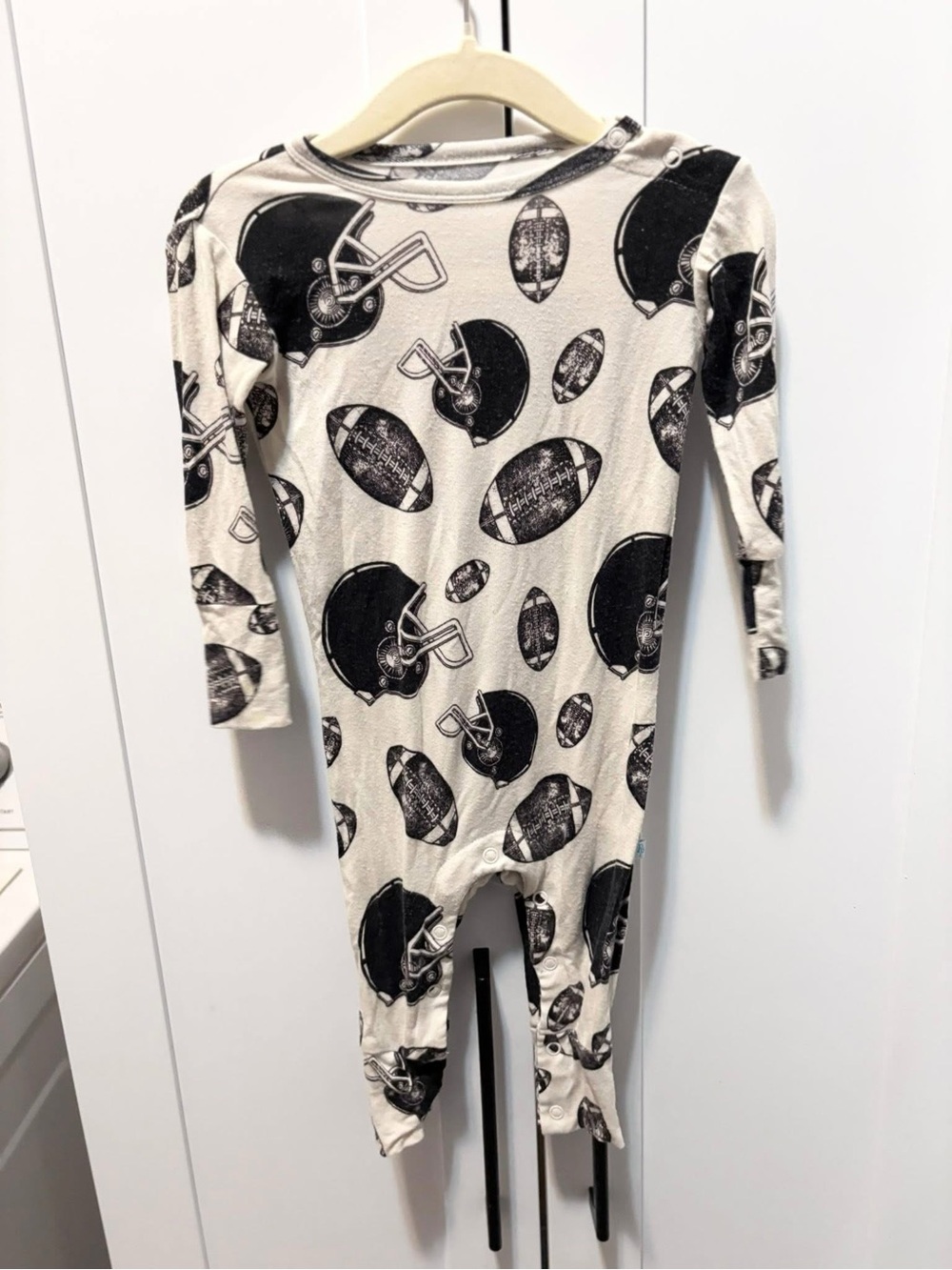 Posh peanut bamboo Cream and Black Football Print Kids One-Piece